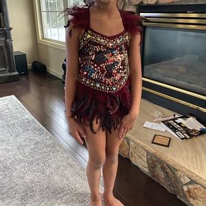 Burgundy/maroon & black, sequin and feather dance costume.
